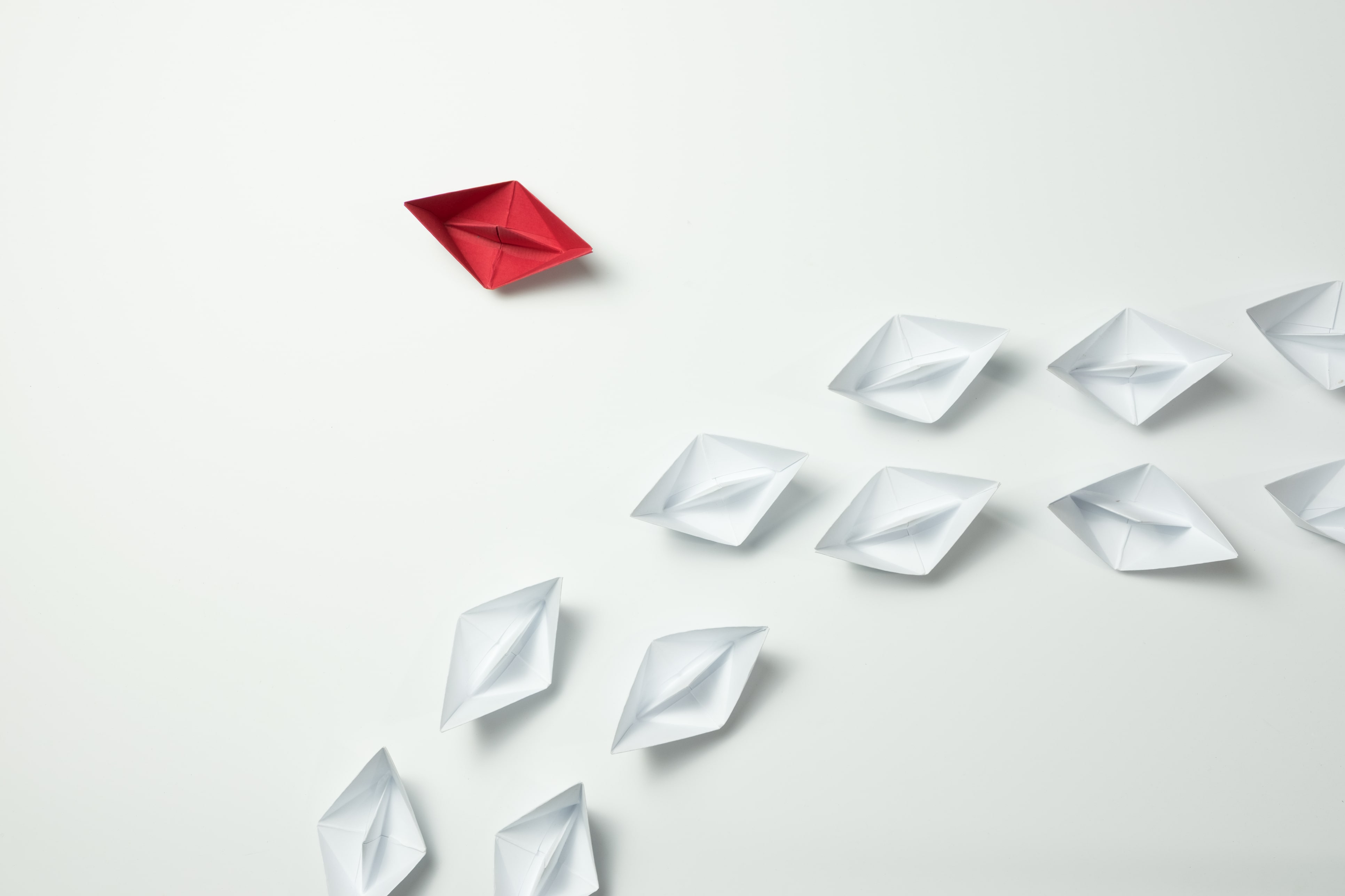 red and silver paper boats